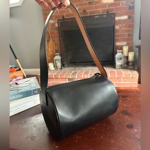 Good Condition - Black leather shoulder Cylinder bag